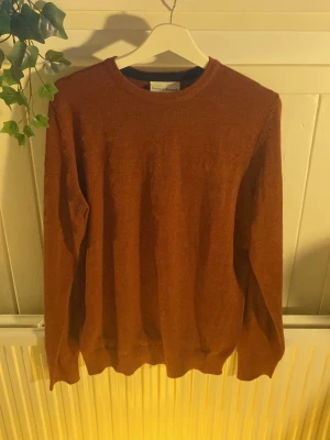 Merinotröja stickad från bruun och stengade  - I fint skick och normal passform.