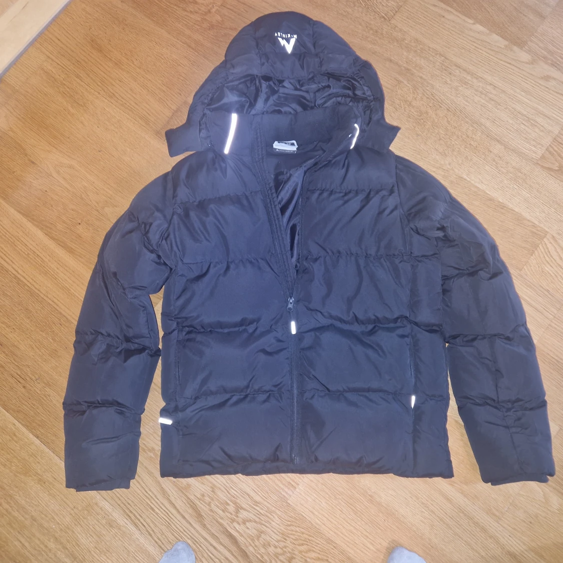 Svart pufferjacka från McKinley