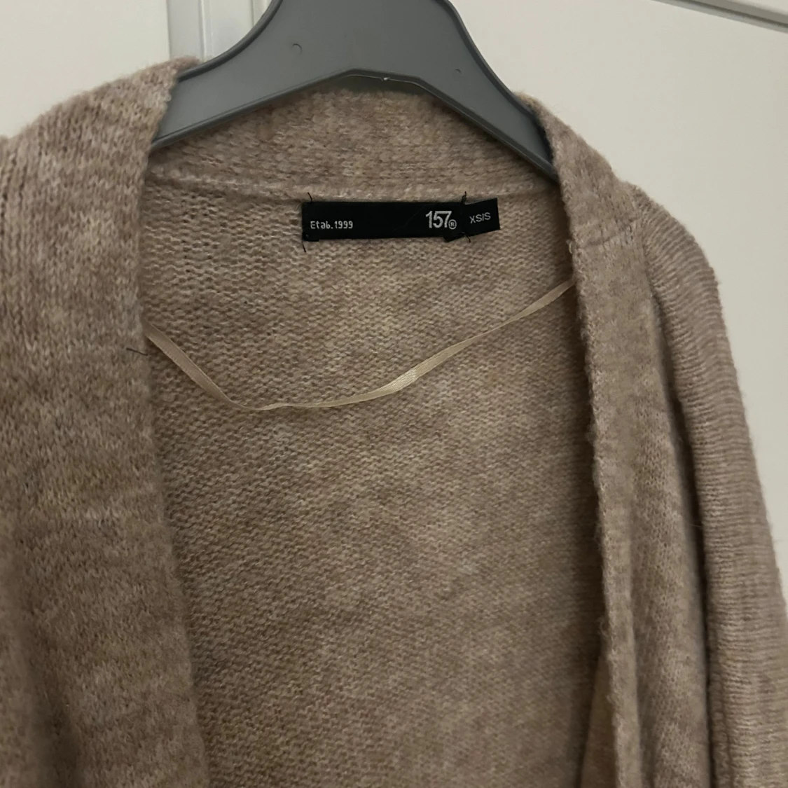 Beige stickad kofta från 157 - 1