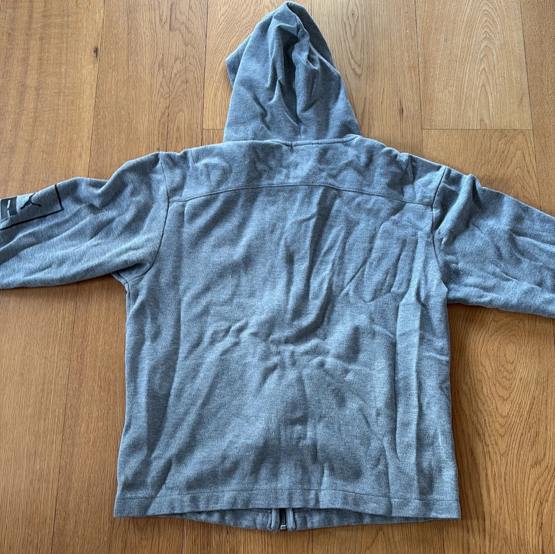 Grå zip-hoodie från Puma - 1