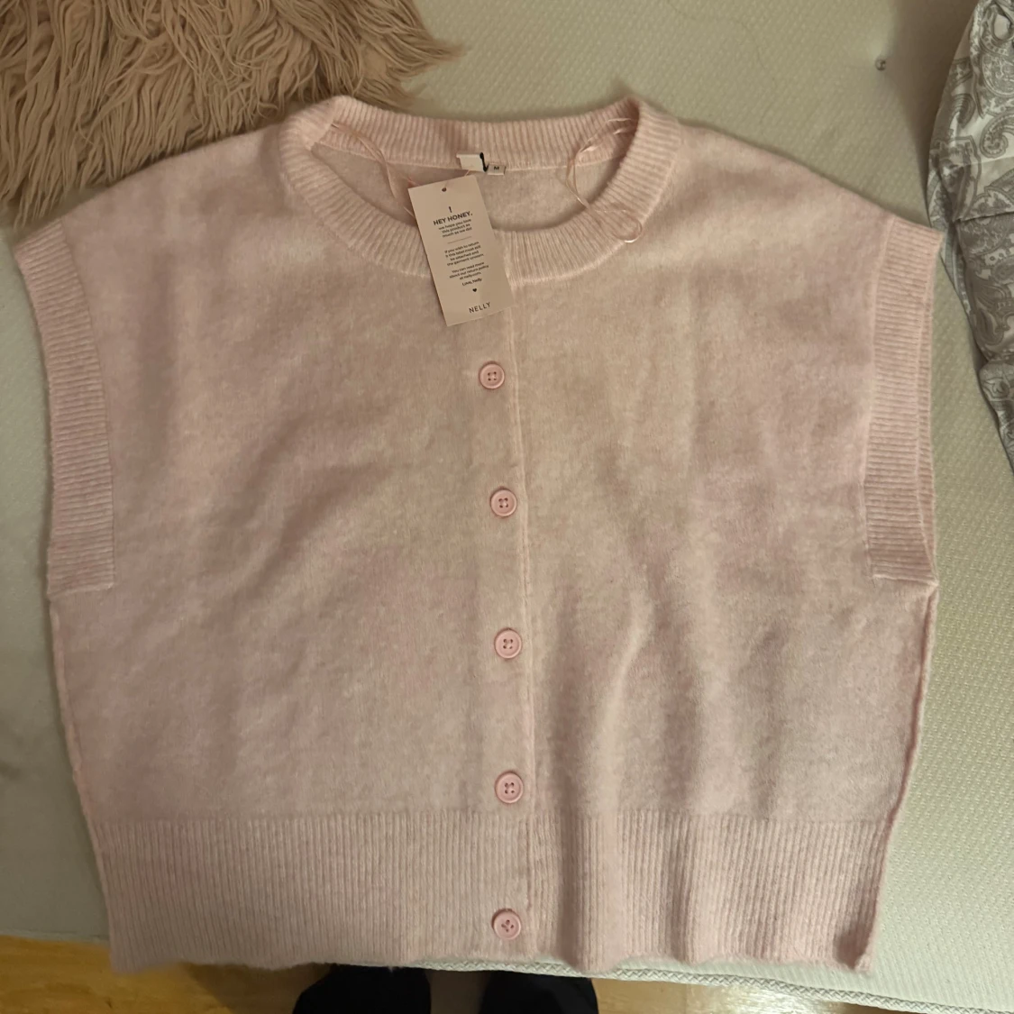 Ljusrosa stickad tröja från Nelly