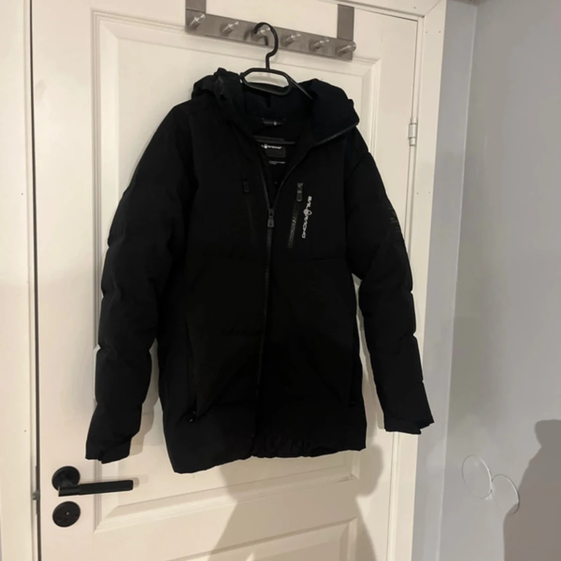 Svart pufferjacka från Sail Racing