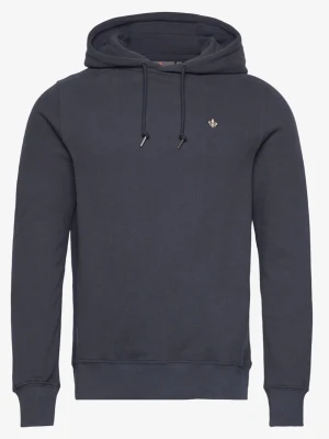 Mörkblå hoodie - Snygg mörkblå hoodie med huva. Liten broderad detalj på bröstet och ribbade muddar vid ärmslut och nederkant. Perfekt för en avslappnad och stilren look.