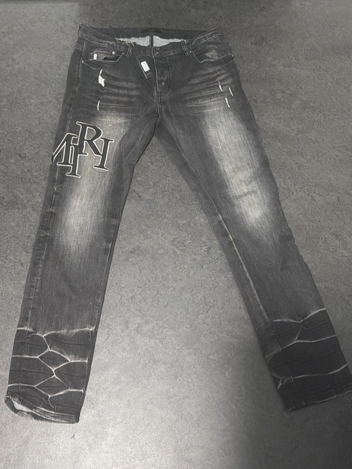 Svarta Amiri jeans med tryck