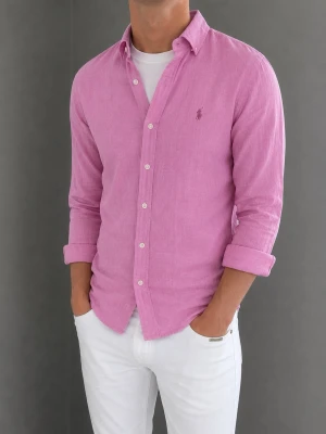 Rosa linneskjorta från Ralph Lauren - Säljer denna Ralph Lauren-linneskjorta. Modellen är 183 cm lång och väger 76 kg. Skriv gärna för fler bilder eller mått!