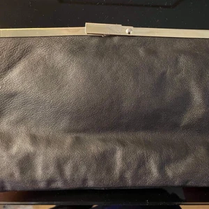 Kuvertväska - Svart Wera want kuvertväska 