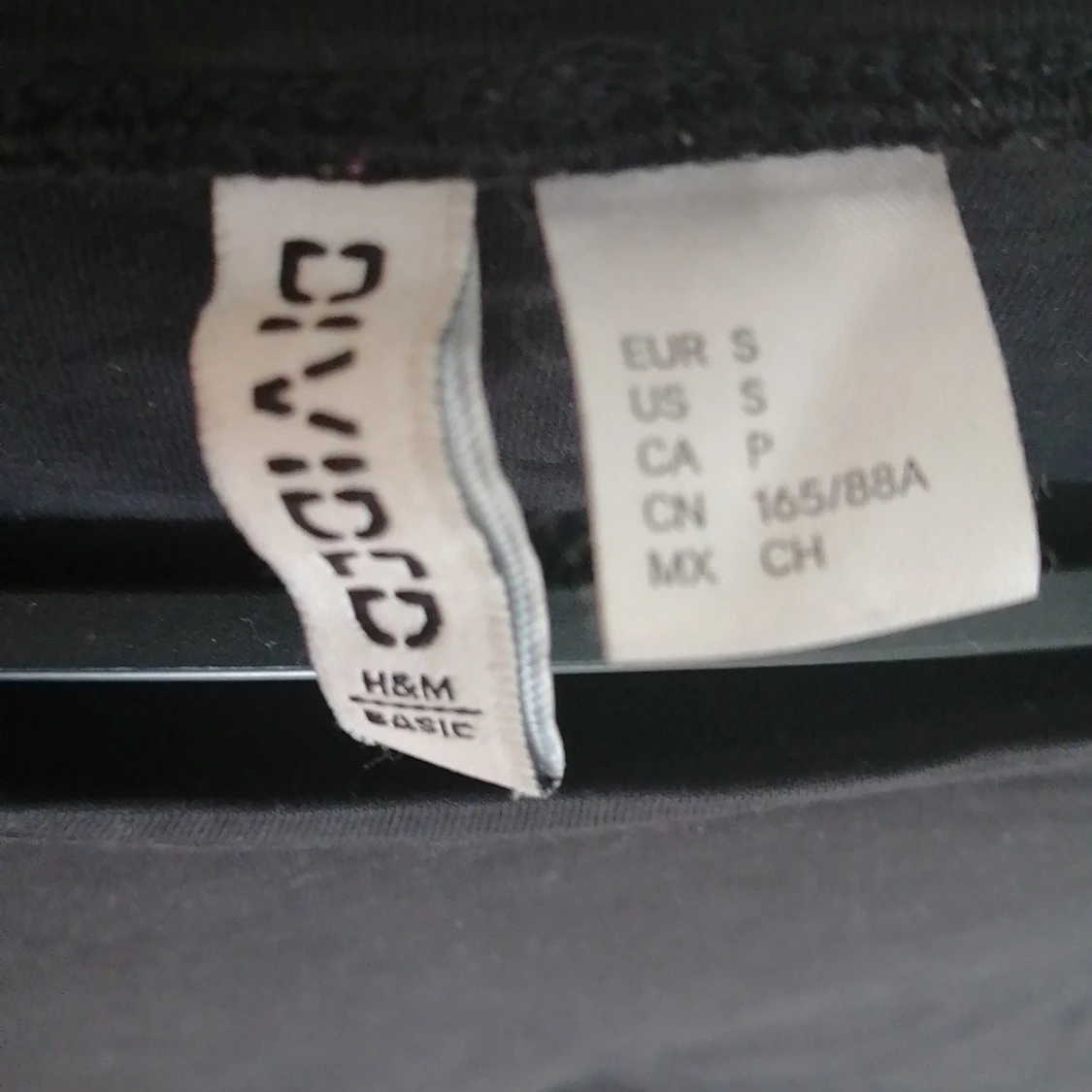 En svart kortkläning  - 91