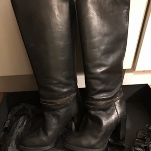 Derimod Boots - %100 Leather. Heel 10 cm. It is used couple of times but in very good condotion 