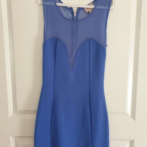 TopShop mini dress size S - TopShop  mini bodycon dress in blue 💙 with a transparent back. A top pick from the London born brand. Bodycon fit perfect for a night out or a date night. Barely used, new condition. 