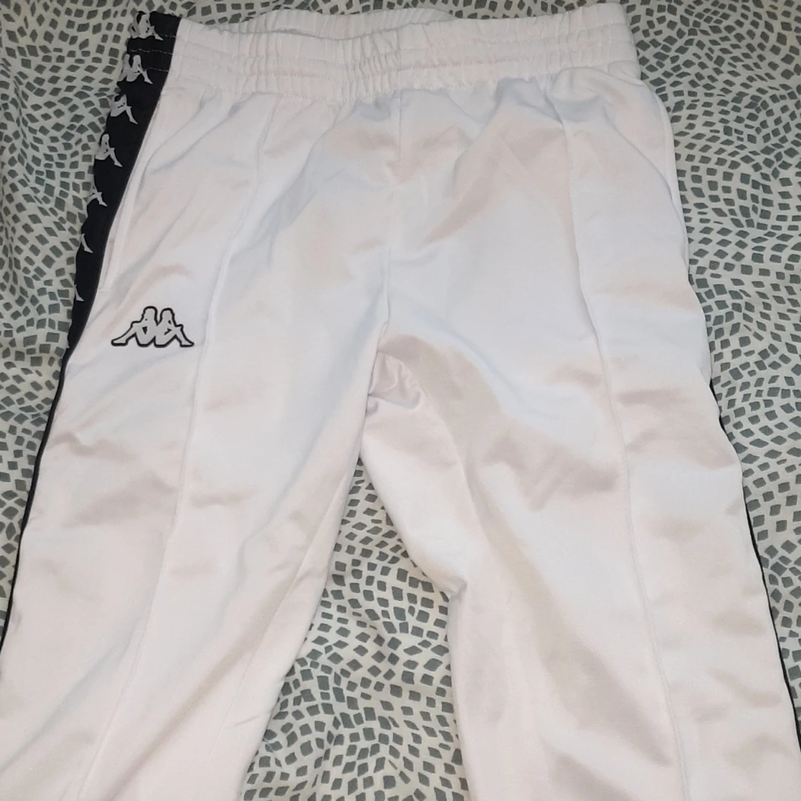 Vita kappa byxor 