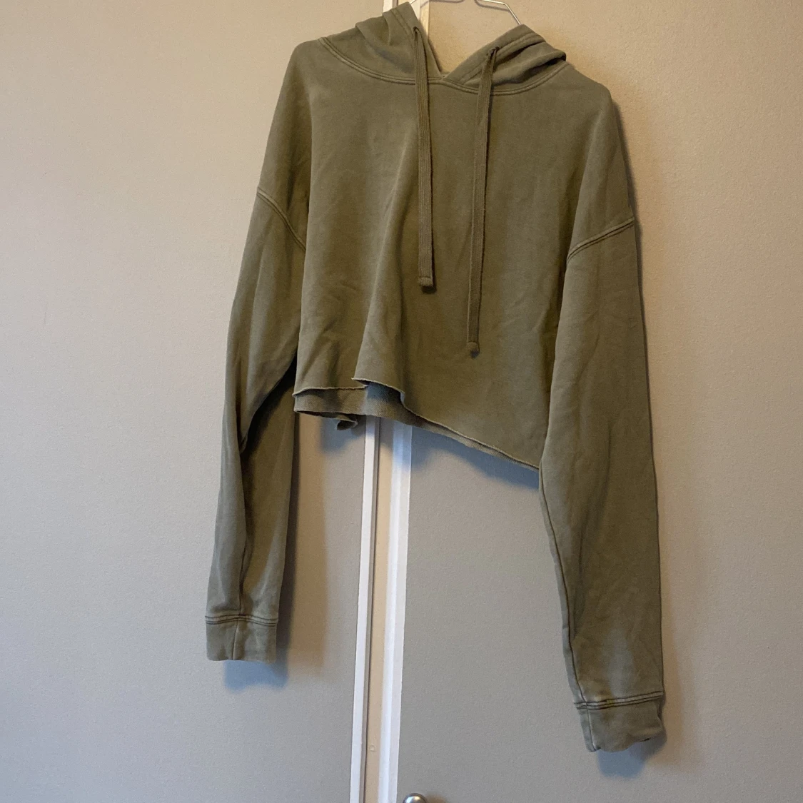 Träningstopp med huva -grön