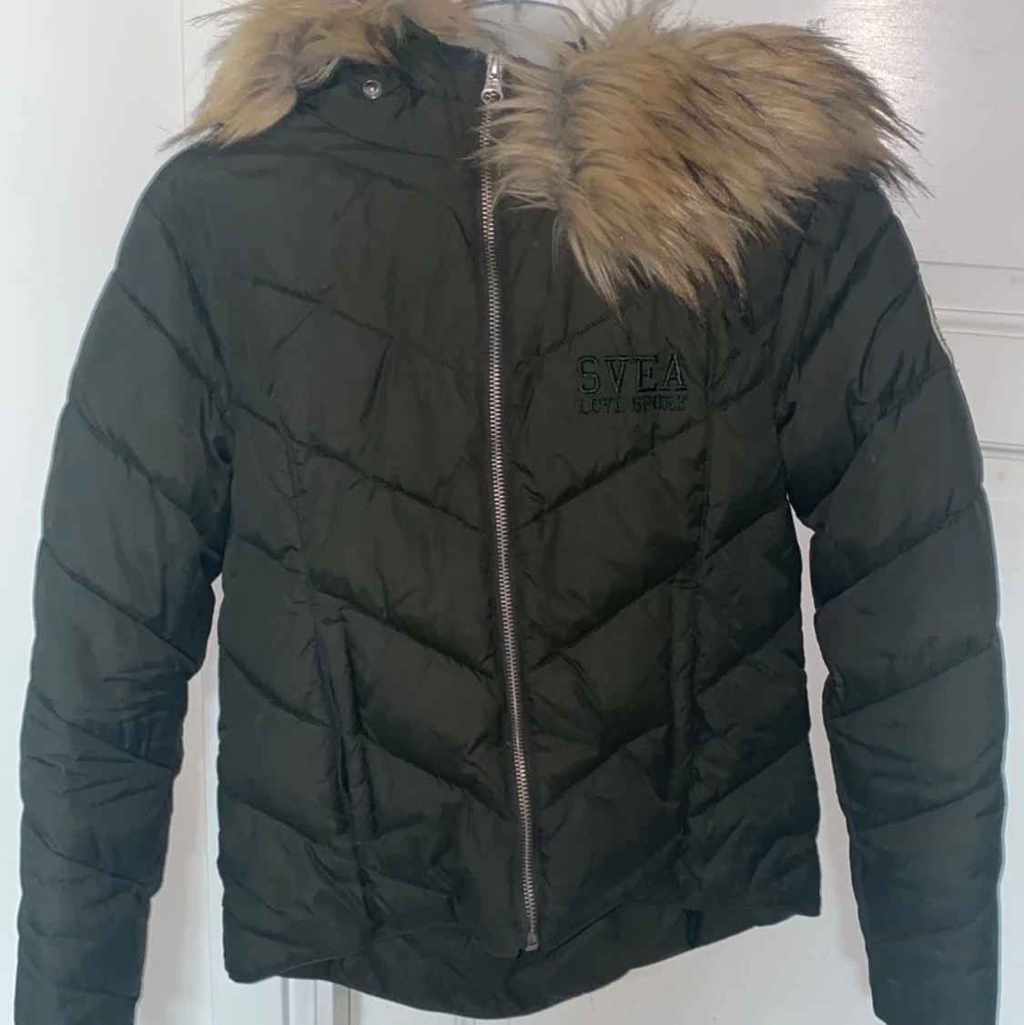 mörkgrön svea-jacka