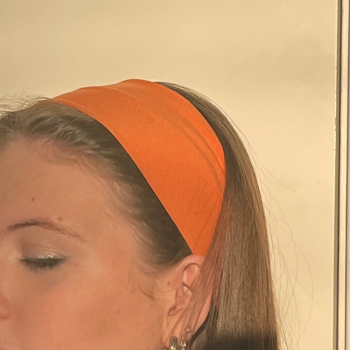 Tyghårband i orange färg  - 90