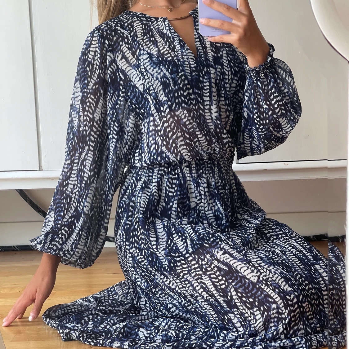 Mönstrad klänning i stl 38