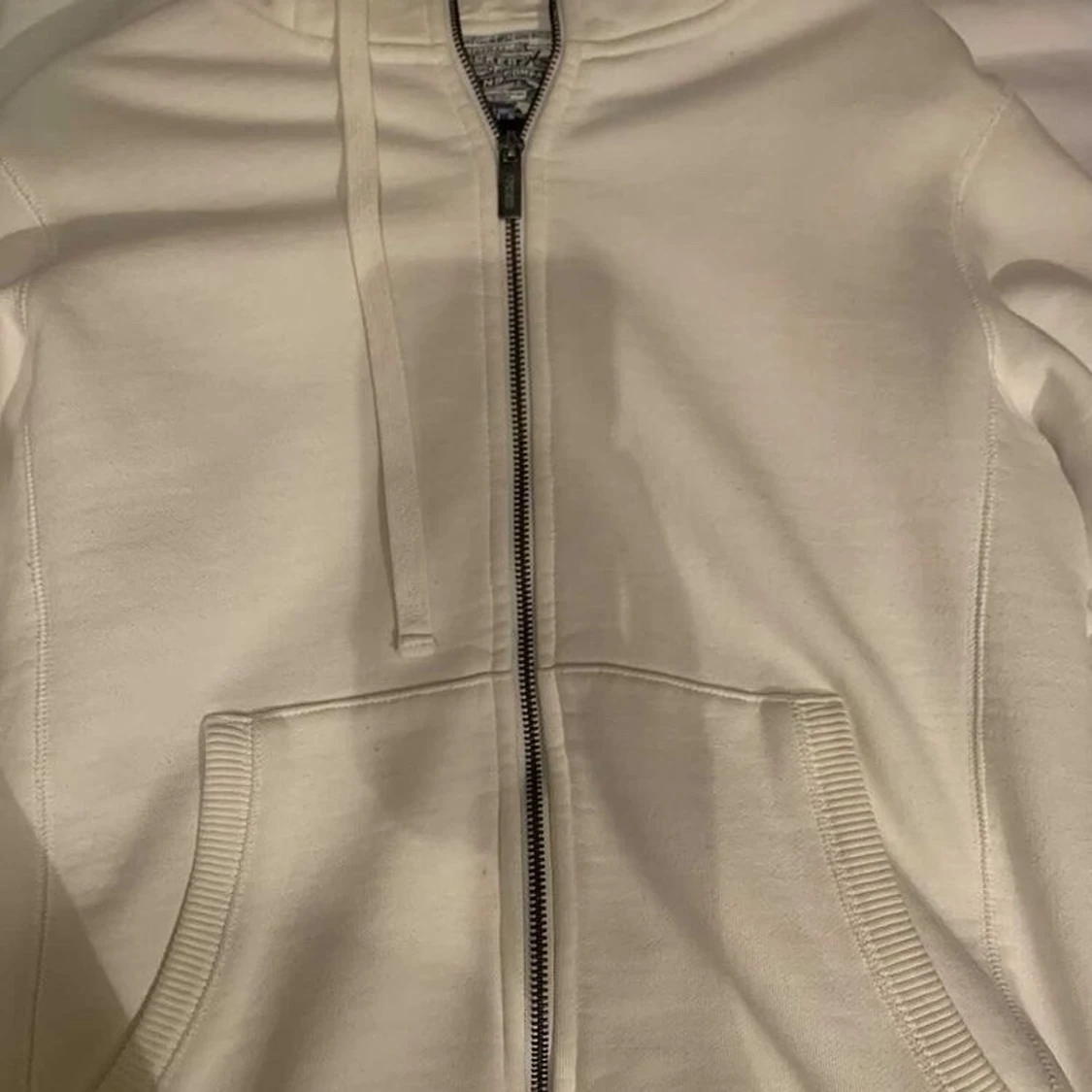 En vit kofta för 75kr