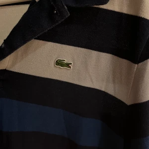 Lacoste piké  - Färgglad oversize piké 