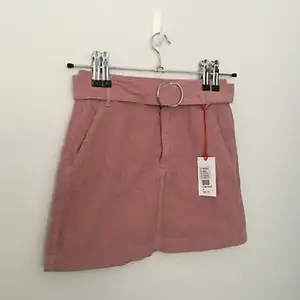 Brand New Rose Pink Skirt in Curdory. Size M 