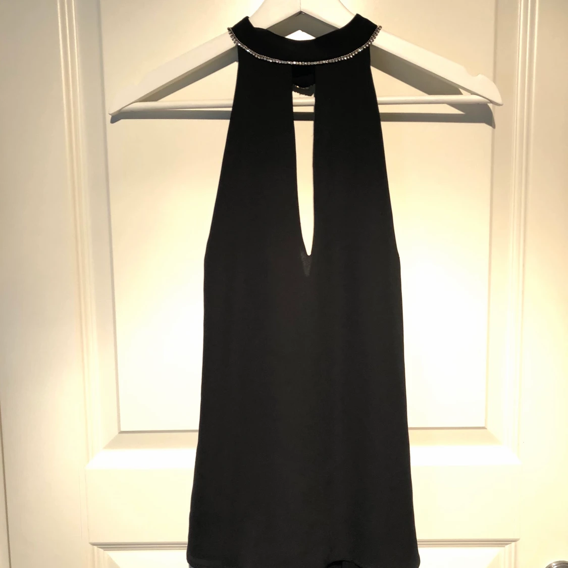 Oanvänt linne, öppen rygg