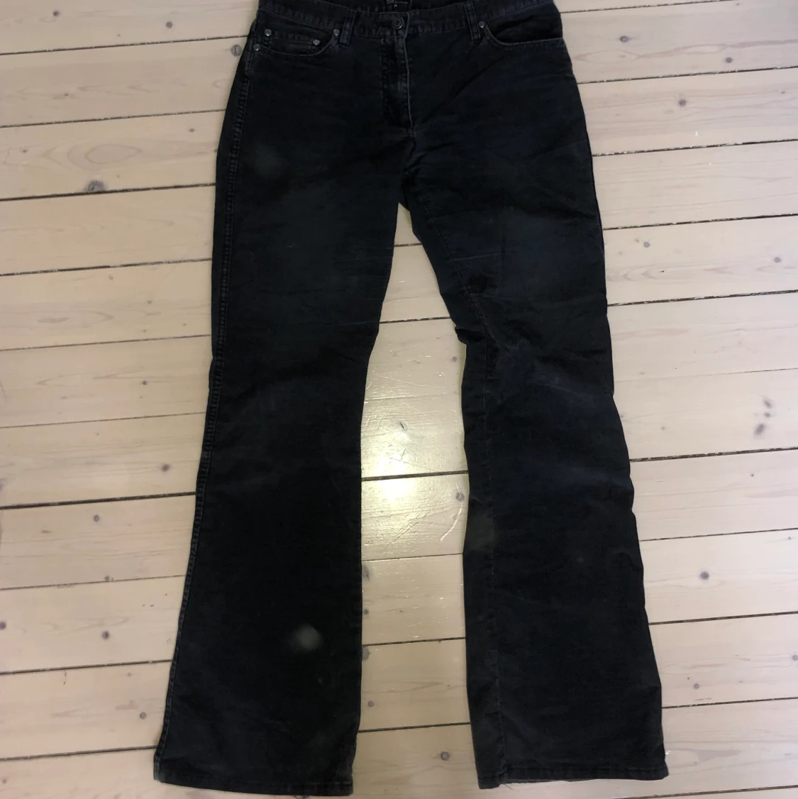 Gråa Bootcutbyxor i Manchester