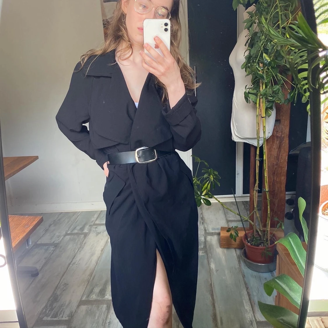 Svart kappa i 100% polyester från BIKBOK  - 90