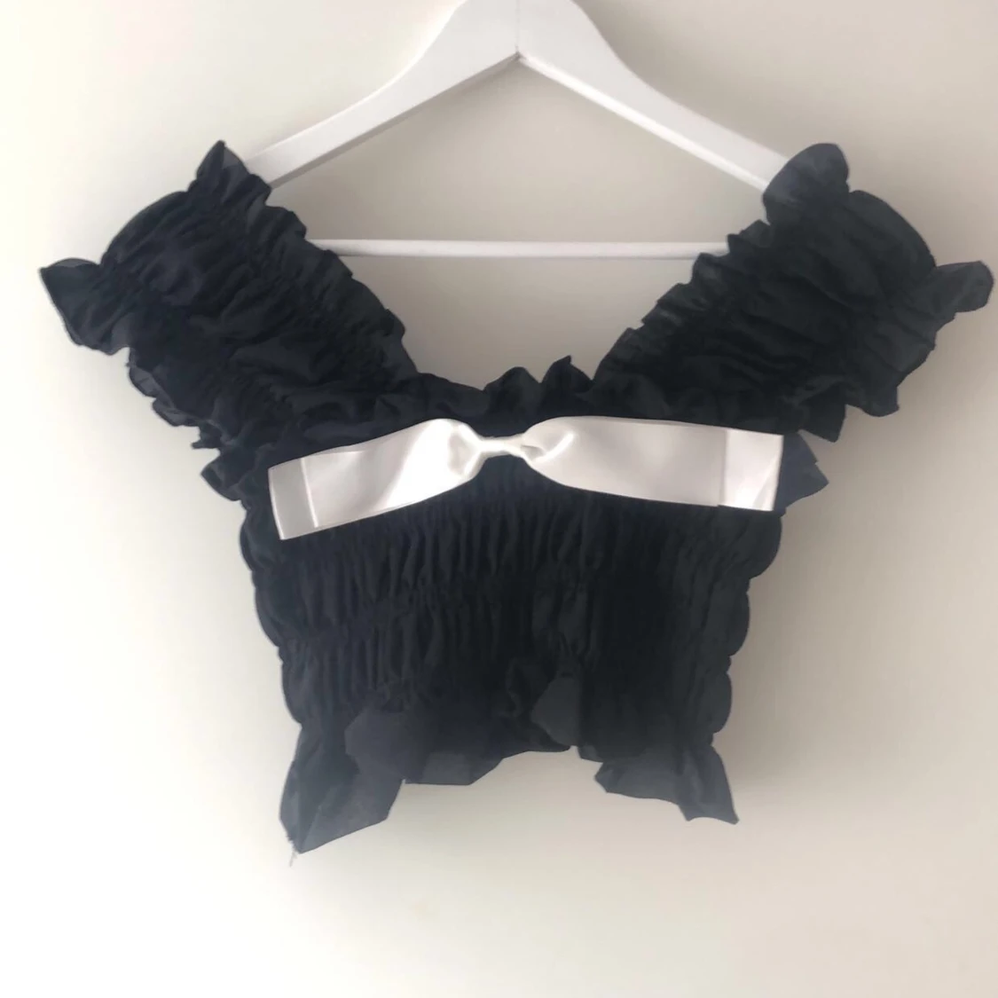 Svart gullig topp från Thailand