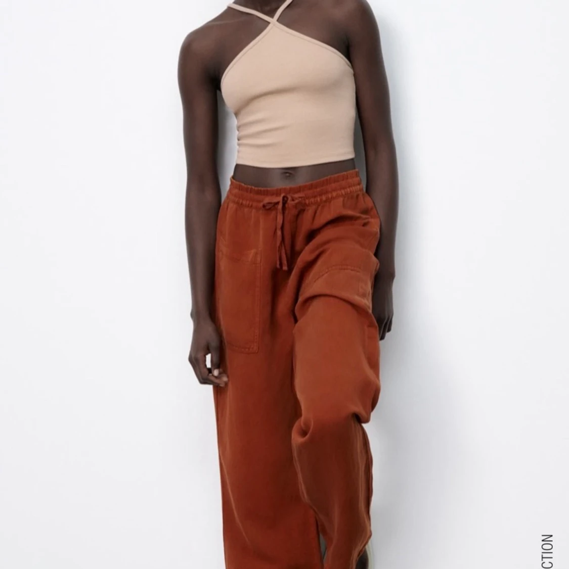 Ribbstickad beige topp  - 90