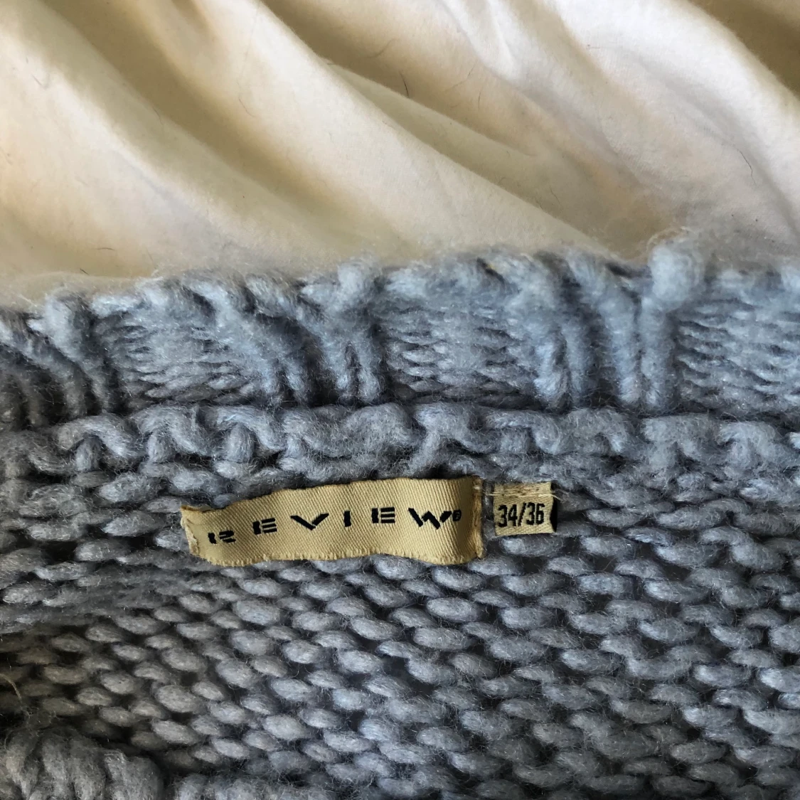 Ljusblå stickad tröja  - 91