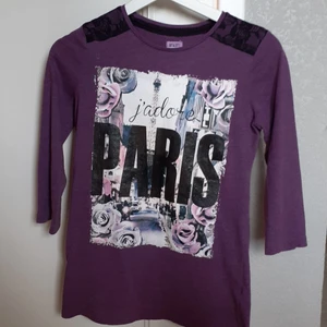 S - Dark purple jumper, jumpers hands are shorter than usual 