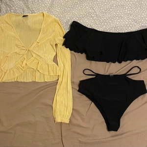 Blus, och ny bikini  - Helt nya plagg. Gul blus i storlek S (knuttar så passar mindre o större) för 50;- och helt ny; fin overshoulder-bikini storlek M för 60:-. Bjuder på frakten. Allt för 100;-