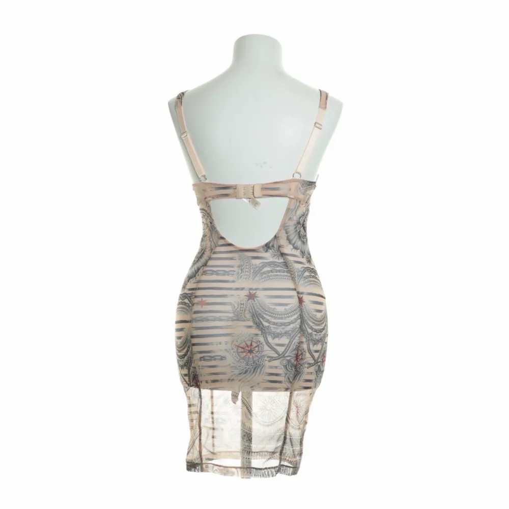 Jean Paul Gaultier stretch mesh dress with built in bra. Cup size: eur: 75B uk: 34B Dress size: S/XS Prefect condition. Klänningar.