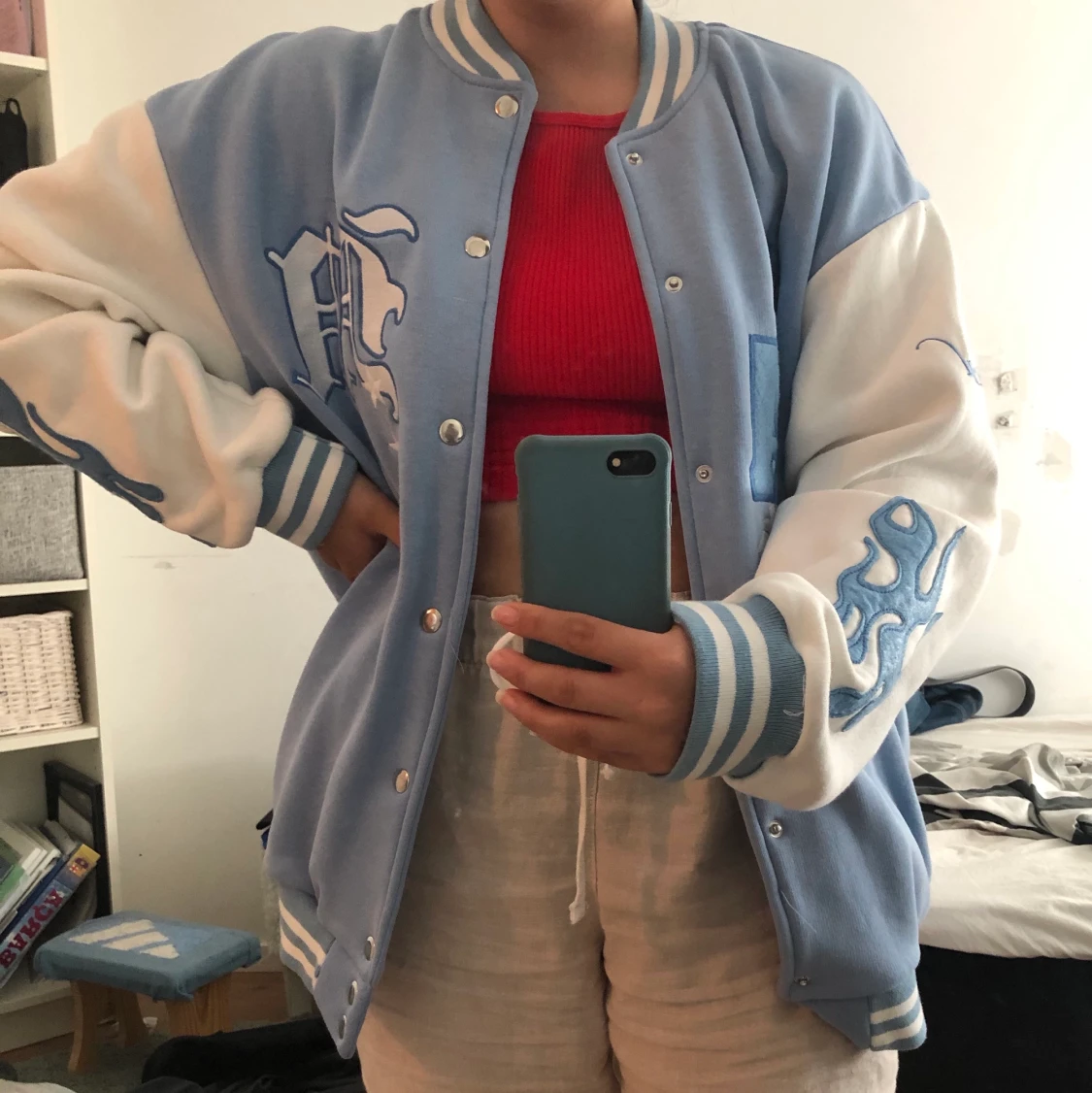 Ljusblå collagejacka