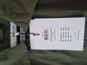 Grön jacka, oanvänd - Grön tunn jacka, herr.  Oanvänd.