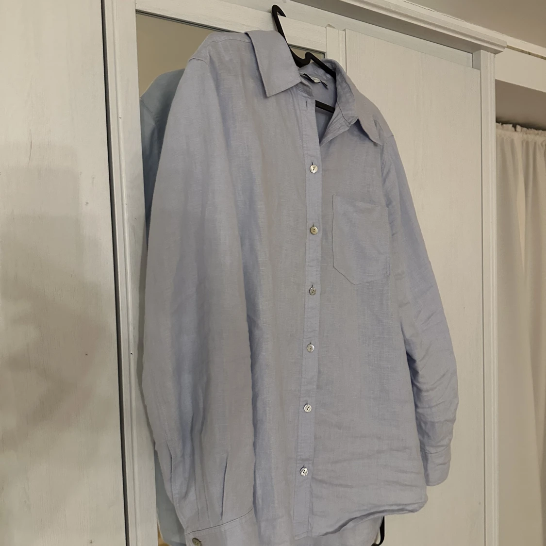 Ljusblå linne skjorta 