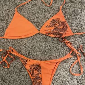 Orange bikini i storlek S