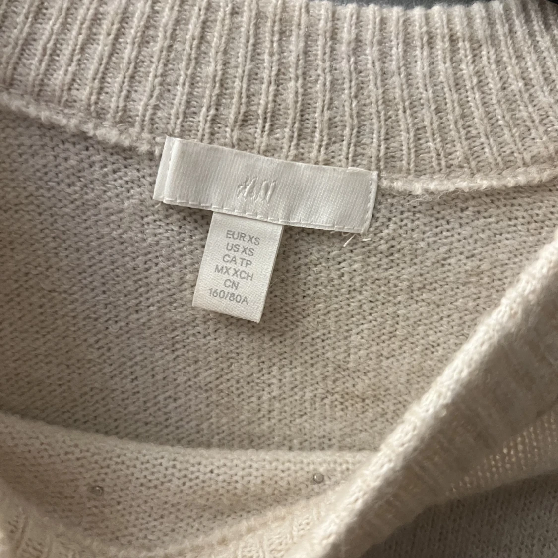 Beige stickad tröja - 91