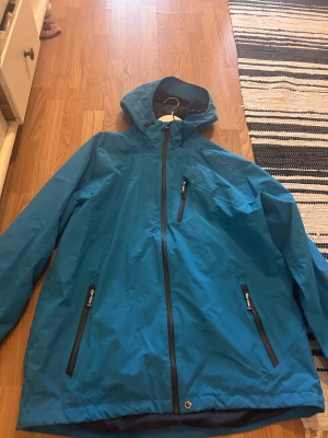 Mckinley jacka  - Mckinley jacka blå oanvänd 250 kr