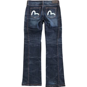 Evisu Lågmidjade Bootcut Jeans Vintage - Riktigt snygga lågmidjade bootcut jeans från Evisu. Storlek 29, ställ gärna frågor😊