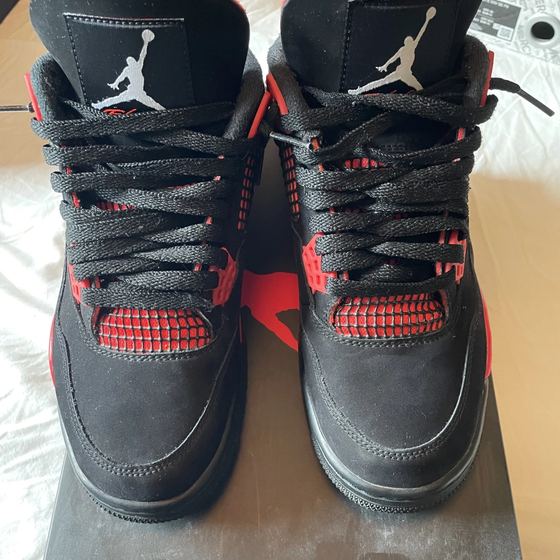 Jordan 4 red thunder