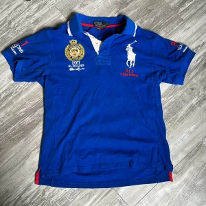 Pikétröja Ralph Lauren Polo sport - Pikétröja från Ralph Lauren i storlek M. 