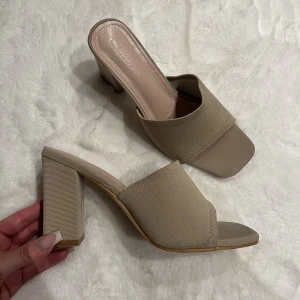 Klackskor  - Använda en gång, storlek 38