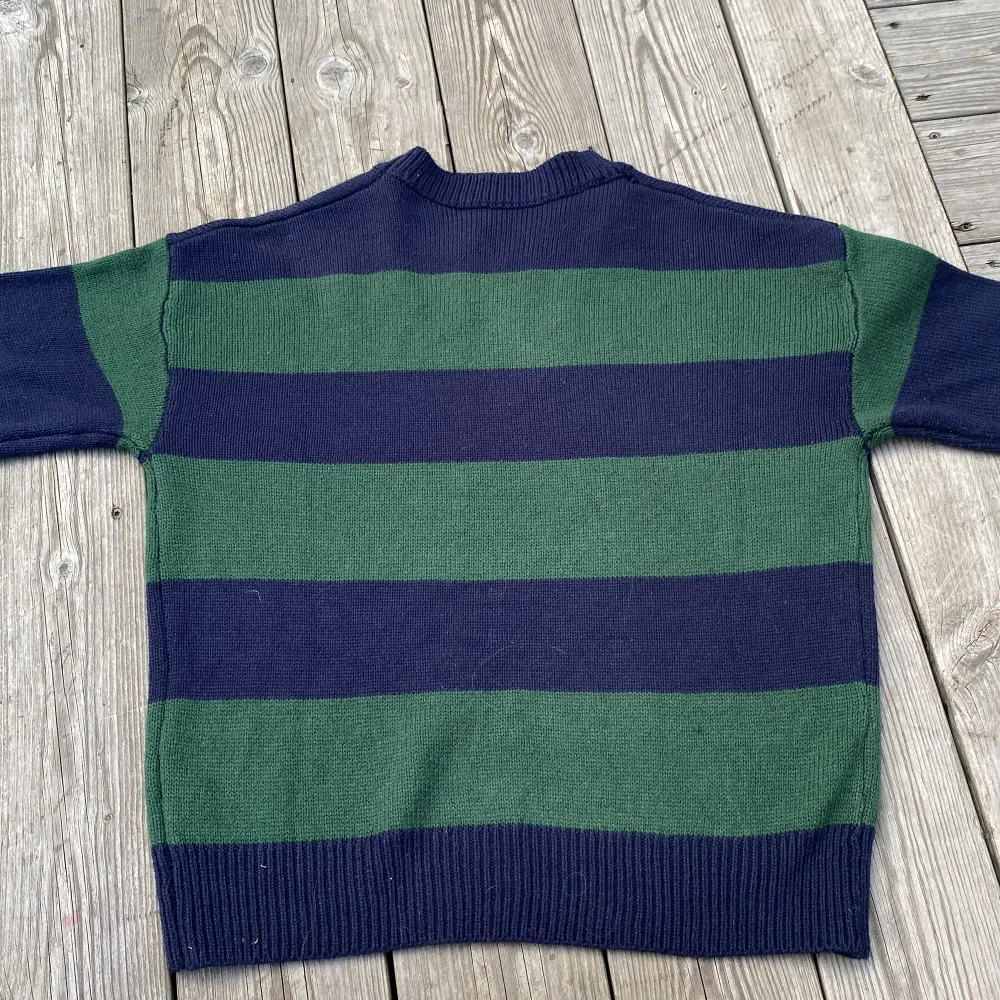Striped Green/Blue sweater, looks like the brandy Melville one, used once at home . Hoodies.