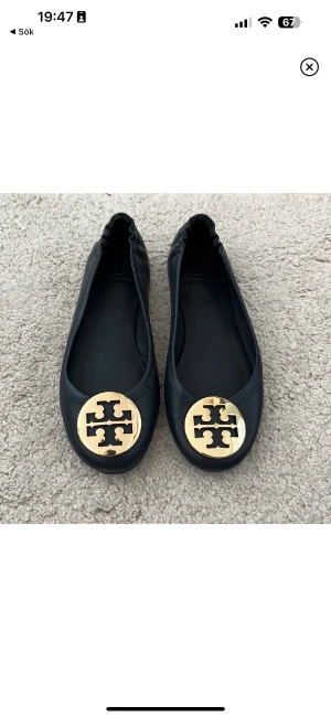 Ballerinaskor Tory Burch - Svarta ballerinaskor från Tory Burch i storlek 36.