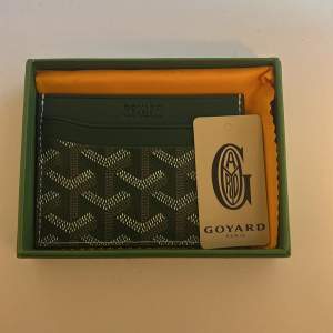 En jävligt grischig goyard plånbok