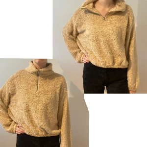 Tjocktröja från H&M  - Beige fluffig tjocktröja från H&M i storlek M med dragkedja halvvägs. Använd fåtal gånger därav nyskick. Säljer pga att den inte kommer till användning.