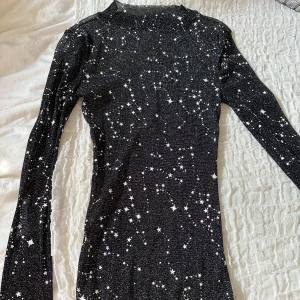 Mesh tröja - En mesh tröja med stjärnmönster.