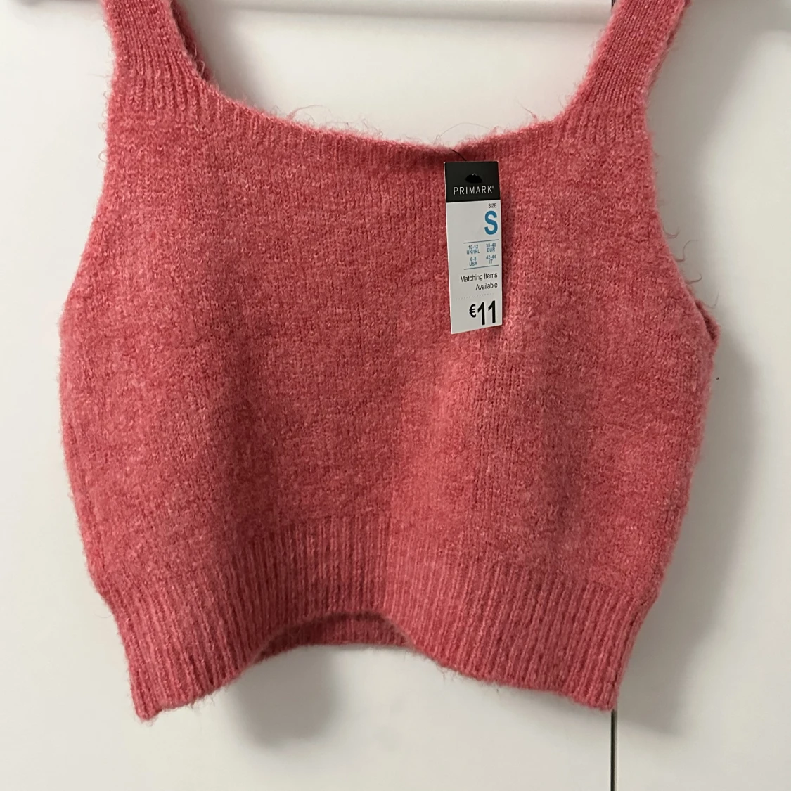 Stickad linne/magtröja