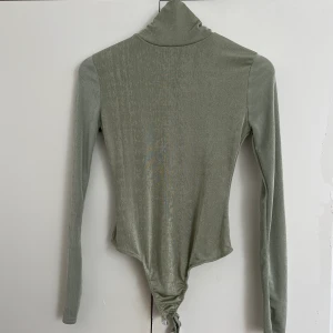 Polotröja  - Tröja i en vacker färg och nytt skick 