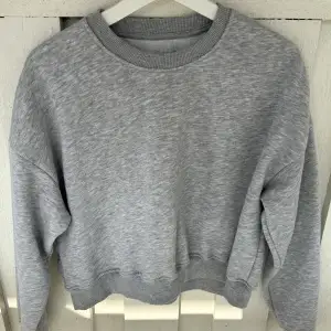grå tröja från lager 157. 
