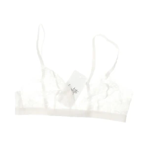 Bralette - Helt oanvänd vit spets bralette med prislapp kvar från Luvlette i storlek M