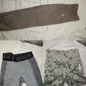 Träningskläder  - 1. Gymshark byxor 150kr 2. Svarta Gymshark shorts 100kr 3. Gröna Gymshark shorts 100kr Allt är i storlek XS